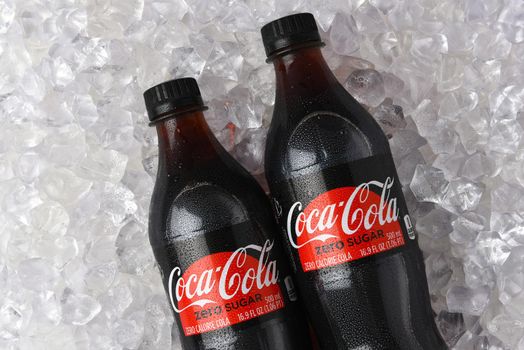 IRVINE, CALIFORNIA - 26 JUNE 2021: Closeup of two plastic bottles of Coca-Cola Zero in a bed of ice.
