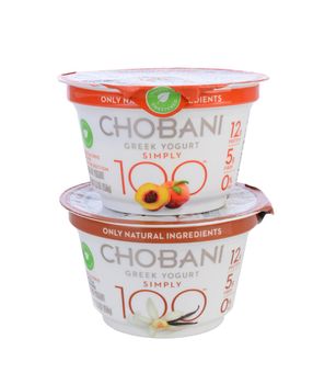 IRVINE, CA - MAY 20, 2014: 2 cups of Chobani Simply 100 Greek Yogurt. Chobani is an American brand launched in 2007 and has become one of the world's leading yougurt manufacturers.
