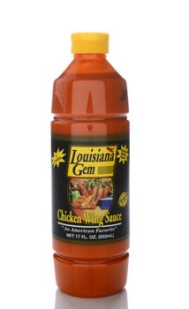 IRVINE, CA - JUNE 14, 2015: A single bottle of Louisiana Gem Chicken Wing Sauce. Packed by Peppers Unlimited in St. Martinville, Louisiana.