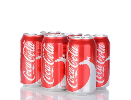 IRVINE, CA - January 05, 2014: A six pack of 12 ounce cans of Coca-Cola Classic, with wave and surfer design. Coca-Cola is the one of the worlds favorite carbonated beverages.