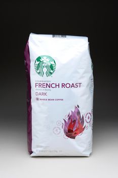 IRVINE, CA - January 21, 2013: A 40 ounce bag of Starbucks French Roast Coffee Beans. Seattle based Starbucks is the largest coffeehouse company in the world, with over 20,000 stores in 62 countries.