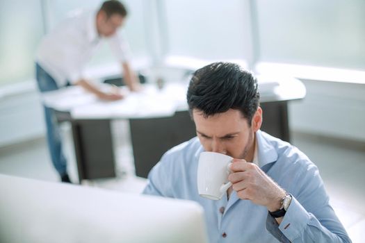 business man working in the office.the concept of professionalism