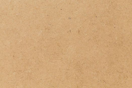 Pressed beige chipboard texture. Wooden background