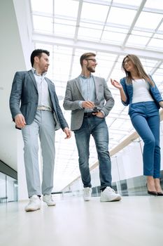 Business people walking in the office corridor.business concept