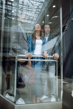 group of business people standing in the Elevator.business concept