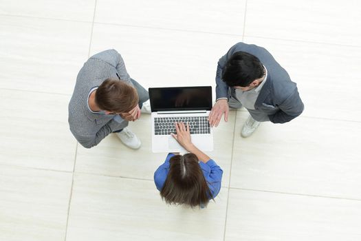 top view.the business group uses a laptop.isolated on white background