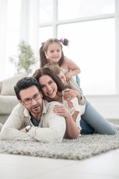 cheerful family relaxes in the living room.the concept of family life