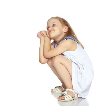 Little girl gesticulating. The concept of people, the child, childhood, play in the theater, reincarnation. Isolated on white background.