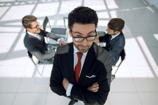 confident businessman on the background of the office.business concept