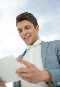 close up.businessman with digital tablet.people and technology