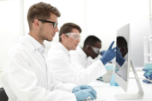 group of scientists conduct laboratory studies.science and technology
