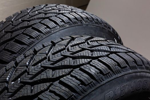 two black tires on the gray background