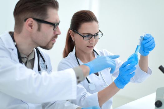 close up.researchers are discussing the results of experiments.people and technology