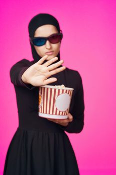 arab woman entertainment cinema popcorn fashion isolated background. High quality photo