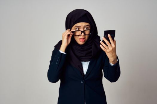 woman in black hijab laptop work technology office. High quality photo