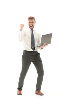 in full growth.happy businessman with laptop.isolated on white background