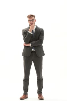 in full growth.portrait of a young thoughtful businessman.isolated on white background