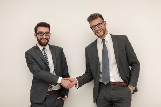 handshake of two business people.isolated on light background