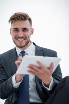 close up.modern businessman with digital tablet.people and technology.