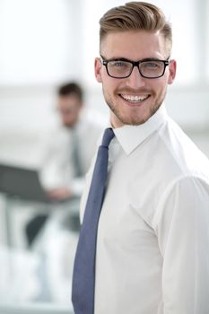 close up.successful businessman on the background of the office.business people