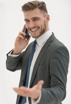 friendly businessman talking on a mobile phone.business concept