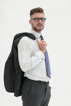 side view .confident businessman with a jacket over his shoulder.isolated on white