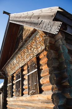 close up photo of the house built from wood logs