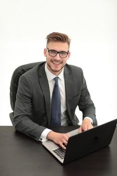 modern businessman uses a laptop.isolated on white