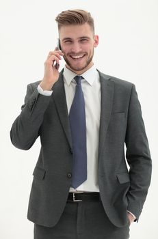 handsome businessman talking on the phone.isolated on white