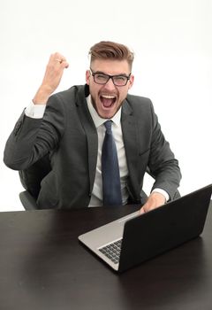 happy businessman looking at laptop screen.isolated on white