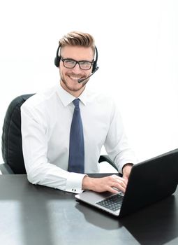 business center employee working on a laptop .photo with copy space