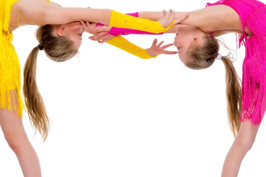 Girls gymnasts perform exercises. The concept of strength, health and sport. Isolated on white background.