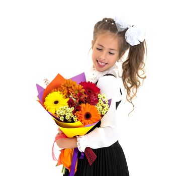 Little girl with a beautiful bouquet of flowers. The concept of holidays, family and children. Isolated on white background.