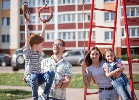 young family on the Playground.the concept of childhood