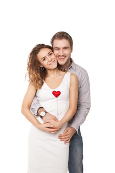 Portrait of joyful couple holding red hearts and laughing isolated on white