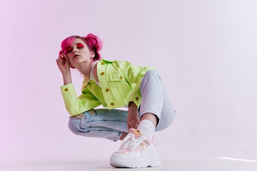 woman with pink hair youth style posing lifestyle neon. High quality photo