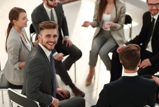 young employee sitting at a workshop.business concept