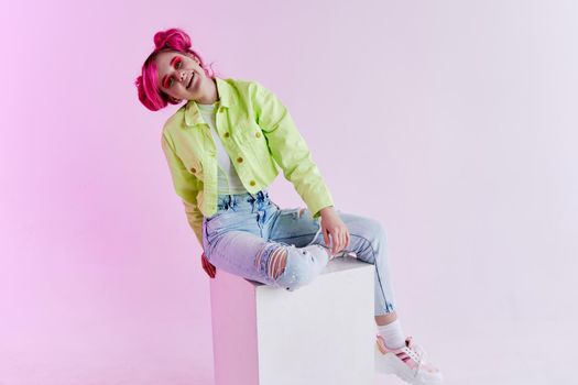 cheerful woman green jacket fashionable clothes studio model. High quality photo