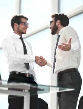 business people shaking hands with each other.the concept of cooperation