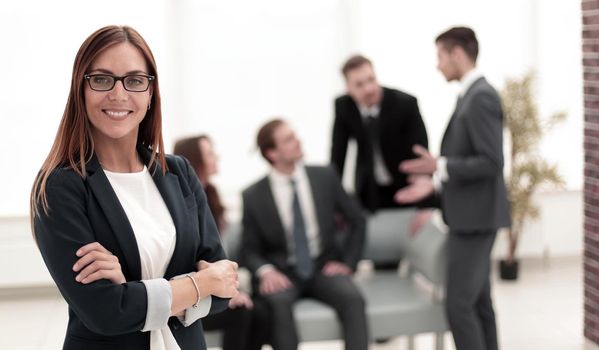 beautiful woman on the background of business people