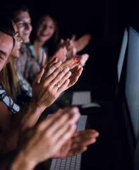 business team applauds during the meeting in the office .success concept