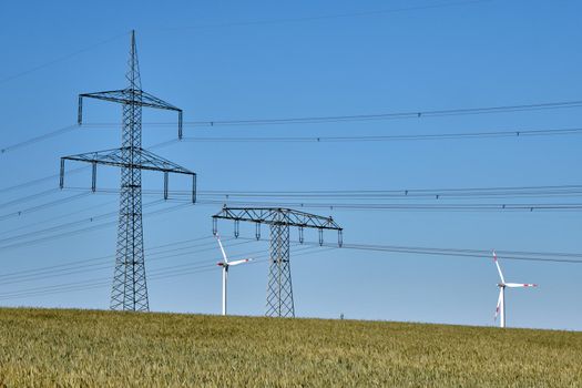 Power lines and wind turbines seen in rural Germany