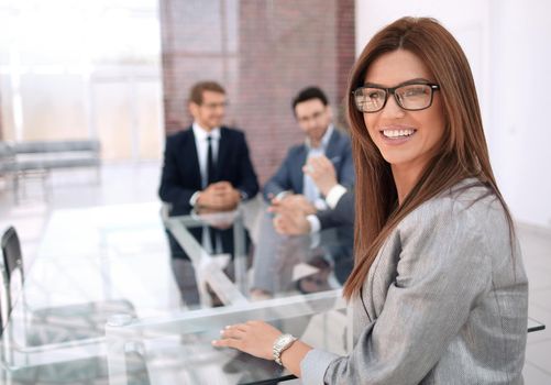 successful business woman sitting at a table in the meeting room .photo with copy space