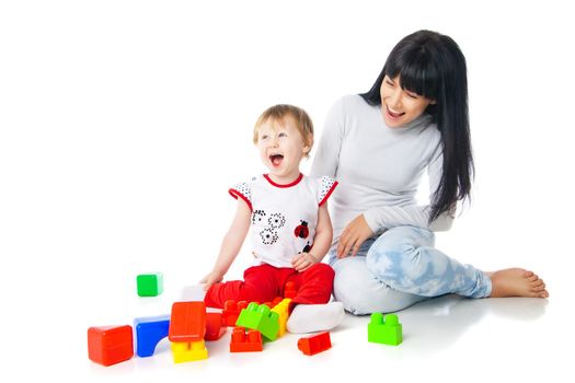 mother and baby playing with building blocks toy isolated on white