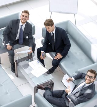 top view.business partners sitting in the meeting room.business concept
