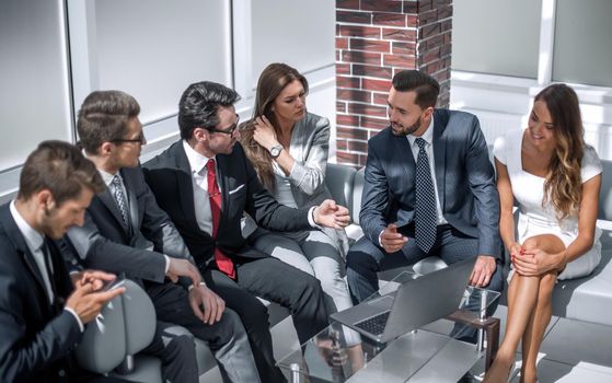 businessman talking to his business team. business meeting