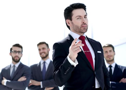 serious businessman standing in the office.photo with copy space