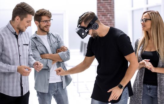 Ophthalmology doctor checks the men's vision with the help of virtual reality goggles. Virtual training