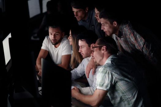 successful business team in the workplace at night.photo with copy space