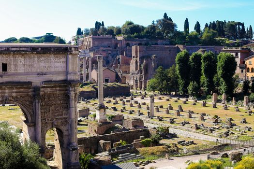 Roman Forum, arches and columns in Rome, Italy. Conceptof antique landmarks and famous sightseeing in Europe.